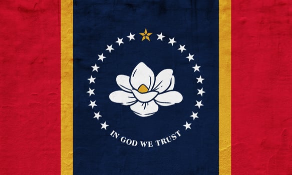 Flag of Mississippi state USA on a textured background. Concept collage. photo