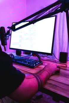 Setup to professional gamer with a white and isolated screen. photo