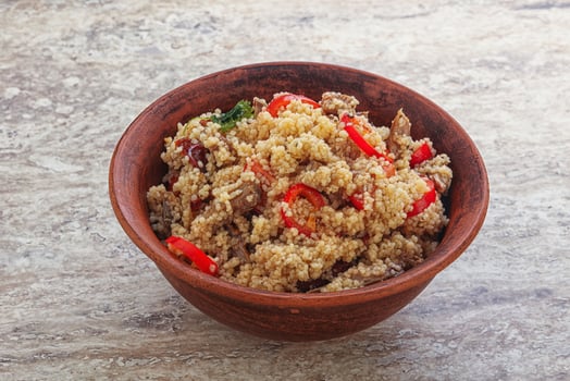 Arabic cous cous with meat and tomato photo