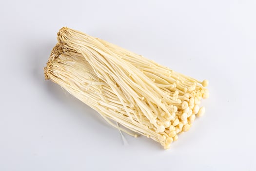 Tasty raw enoki mushroom heap photo
