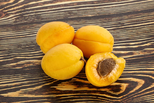 Sweet ripe tasty apricot heap photo