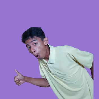Asian man smiling face with okay gesture, isolated on purple background photo