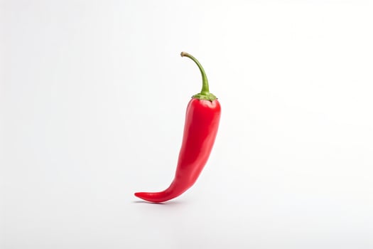 AI generated Red hot pepper levitates on a white background copyspace Generative AI photo
