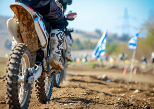 AI generated Motocross rider riding on dirt track closeup tyre Generative AI photo