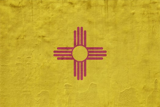 Flag of New Mexico state USA on a textured background. Concept collage. photo