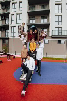 Group of many happy teenagers dressed in casual clothes having fun and having fun near college. Concept of friendship, moments of happiness. School friendship photo