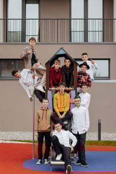 Group of many happy teenagers dressed in casual clothes having fun and having fun near college. Concept of friendship, moments of happiness. School friendship photo