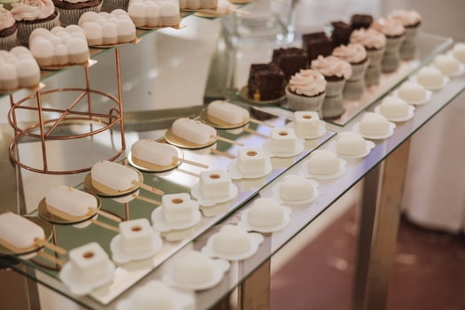 Almond cookies and various sweet cakes for a wedding banquet. A delicious reception, a luxurious ceremony. Table with sweets and desserts. Delicious colorful French desserts on a plate or table. photo