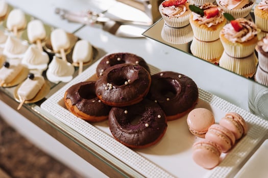 Almond cookies and various sweet cakes for a wedding banquet. A delicious reception, a luxurious ceremony. Table with sweets and desserts. Delicious colorful French desserts on a plate or table. photo