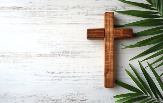 AI generated Wooden cross and palm leaf on white table, palm crosses image photo