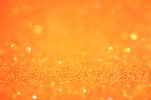 Orange background with a thin focus part and a defocus part. Defocus light abstract. photo