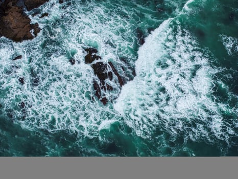 Aerial view of the huge Pacific ocean waves photo