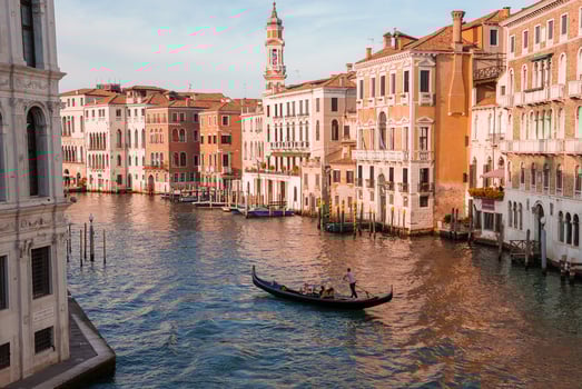 Tranquil Grand Canal in Venice, Italy with Gondolas Gliding - Serene Waterfront Architecture View photo