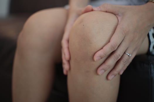 Knee massage relieves pain photo
