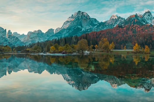 Beautiful lake jasna in kranjska gora with visible reflections of Razor and Skrlatica in the water in early autumn photo