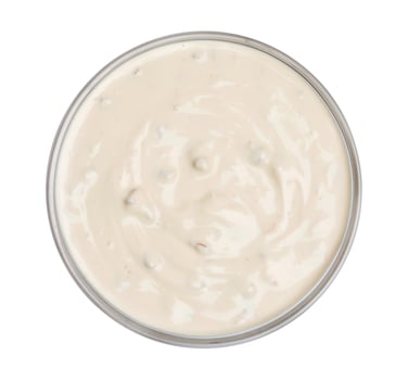 Mushroom sauce isolated on white background, top view photo