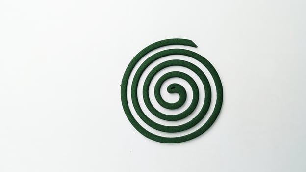 Mosquito repellent coil isolated on white background photo