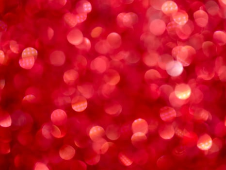 Red Sparkling Glitter bokeh Background. photo
