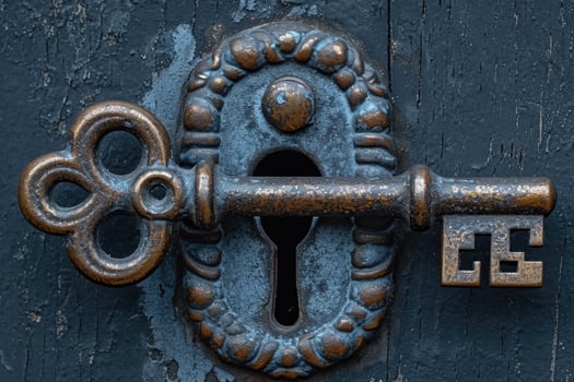 AI generated An old designer key with a lock decoration lies on a wooden background photo