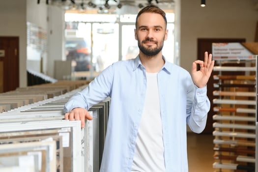 Man choosing tiles at building market photo