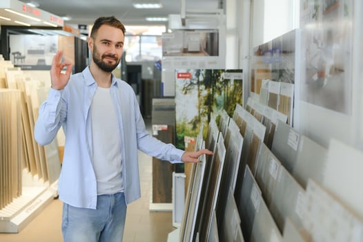 Man choosing tiles at building market photo