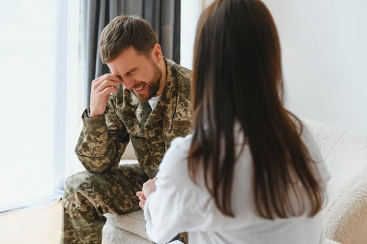 Psychologist supporting military officer in office photo