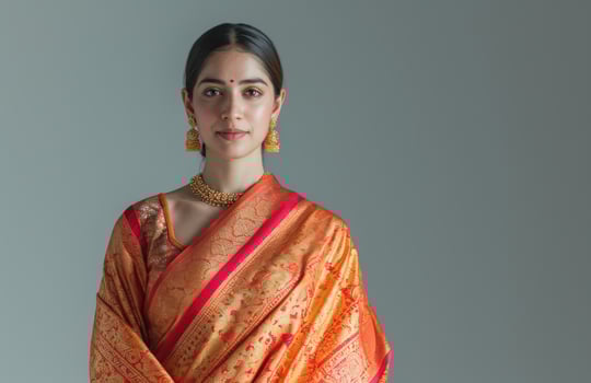 AI generated Woman in marathi saree standing gracefully on gray background, gudi padwa traditional clothing concept photo