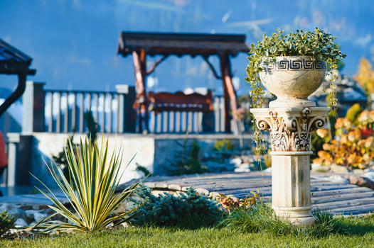 Backyard Garden Modern Design Landscaping. Landscaped Back Yard. Decorative Garden With Pathway Or Walkway From Stone And Rocks Or Gravel. Back Yard Or Park Lawn With Stony Natural landscaping. photo