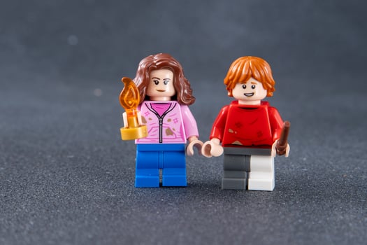 Ron and Hermione. Lego Harry Potter minifigures. Children's designer toy made of bricks and plastic parts. Ukraine, Kyiv - January 17, 2024 photo