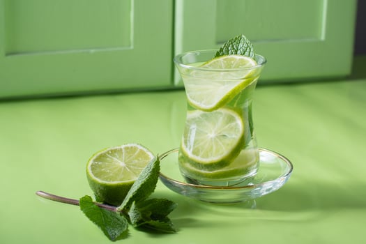 tea with mint and lime, with a calming effect, green still life close-up photo