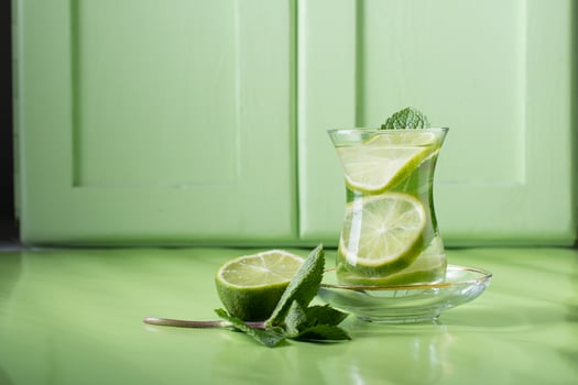 tea with mint and lime, with a calming effect, green still life close-up photo