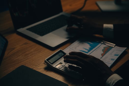 Thoughtful focused successful caucasian male stock investor, broker, financial adviser, sits at work desk, looks at computer, pensively analyze risks and prospects, rise or fall of cryptocurrency coin photo