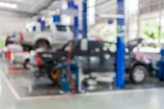 car service centre auto repair workshop blurred background photo