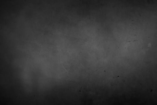Dark grey black textured concrete background photo