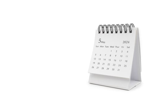 Simple desk calendar for May 2024 isolated on white background. Calendar concept with copy space. photo