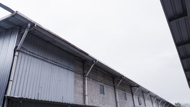 Industrial building with steel roof construction photo