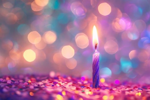 AI generated Birthday cake with burning candle on colorful bokeh lights background photo