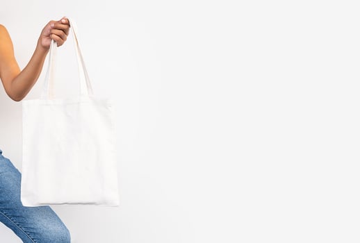Choose shopping with reusable textile bag. Tote bag mock up. photo