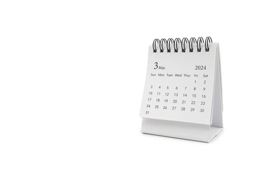 Simple desk calendar for March 2024 isolated on white background. Calendar concept with copy space. photo