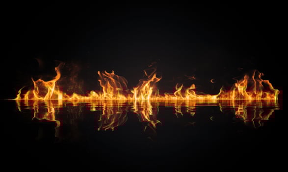 AI generated Fire flames on black background. Abstract blaze fire flame texture background. photo