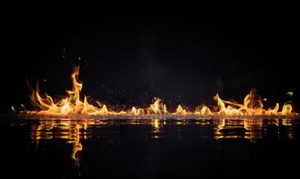 AI generated Fire flames on black background. Abstract blaze fire flame texture background. photo