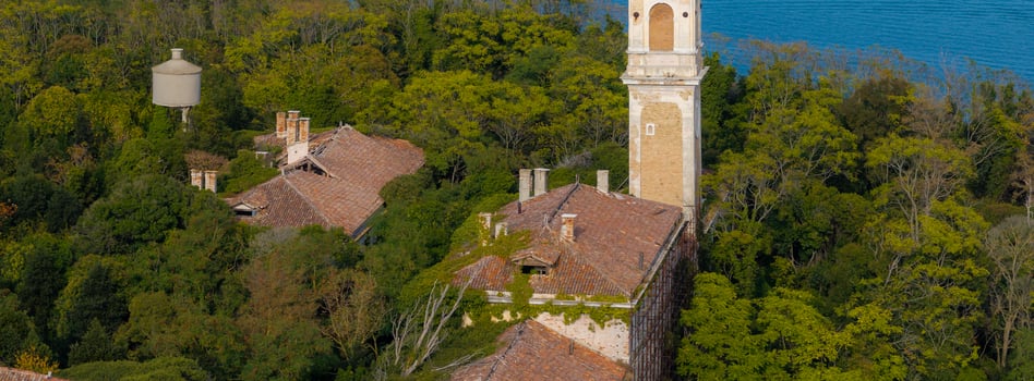 Aerial view of the plagued ghost island of Poveglia in the Venetian lagoon photo