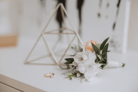 Bride's engagement ring, stilettos, Perfume. Wedding details of the bride. Flowers Beautiful light. wedding dress photo