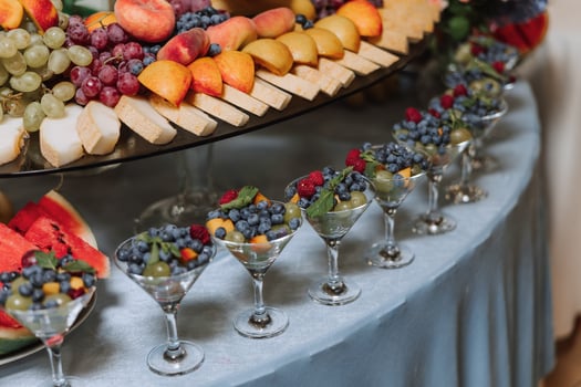 Fruit buffet for a wedding. Assortment of exotic fruits in the restaurant. Various compositions from fresh fruits. photo