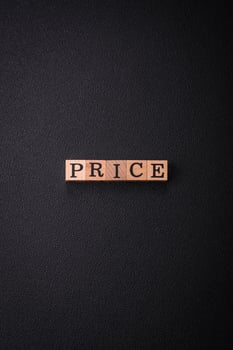 The inscription Price inspection made of wooden cubes on a plain background photo