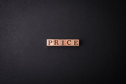 The inscription Price inspection made of wooden cubes on a plain background photo