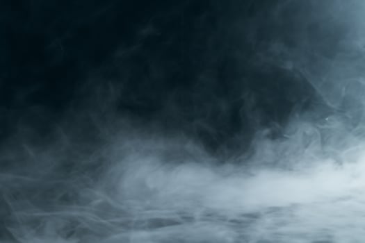 Texture of white smoke on a black background photo
