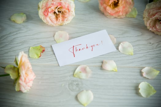bouquet of beautiful orange roses on table photo