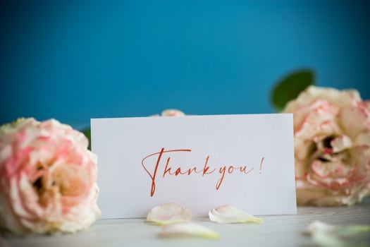 bouquet of beautiful orange roses on table photo