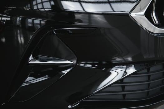 elements of the design of a modern car in a car showroom photo